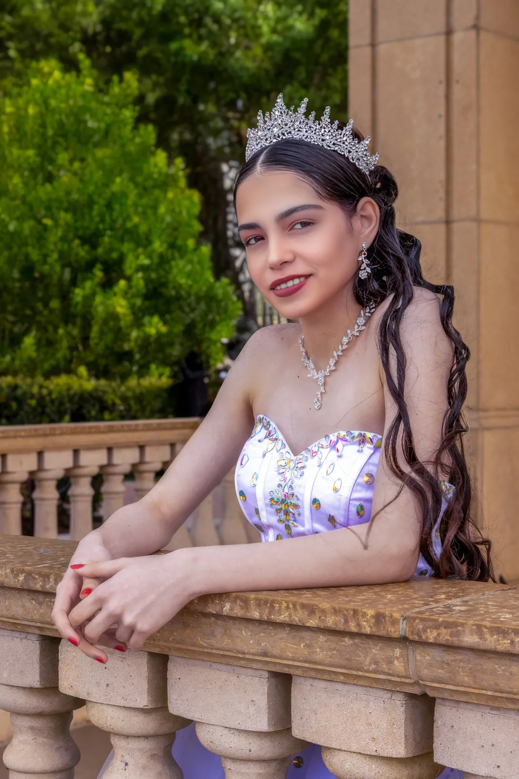 Quinceañera in a lavender gown and tiara